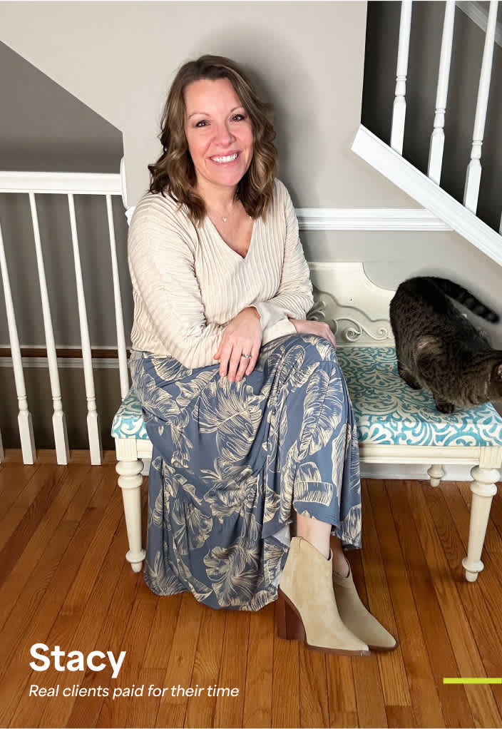 Stacy: Woman in a cozy knit sweater and printed maxi skirt with tan booties—boho-inspired fall outfit for women in their 50s.