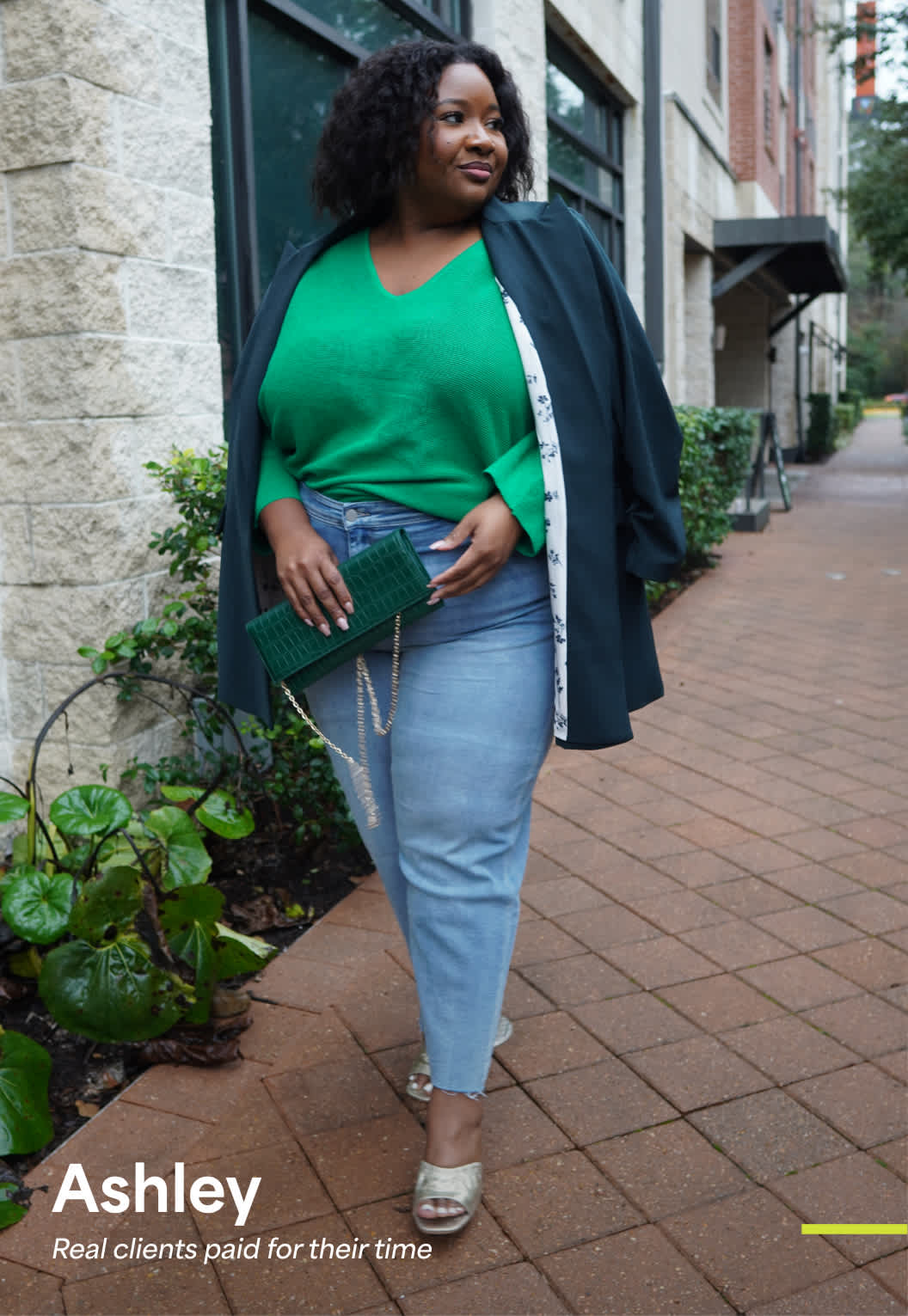 Ashley, a Stitch Fix plus-size client, wearing a green top, blue jeans, and a draped cardigan.