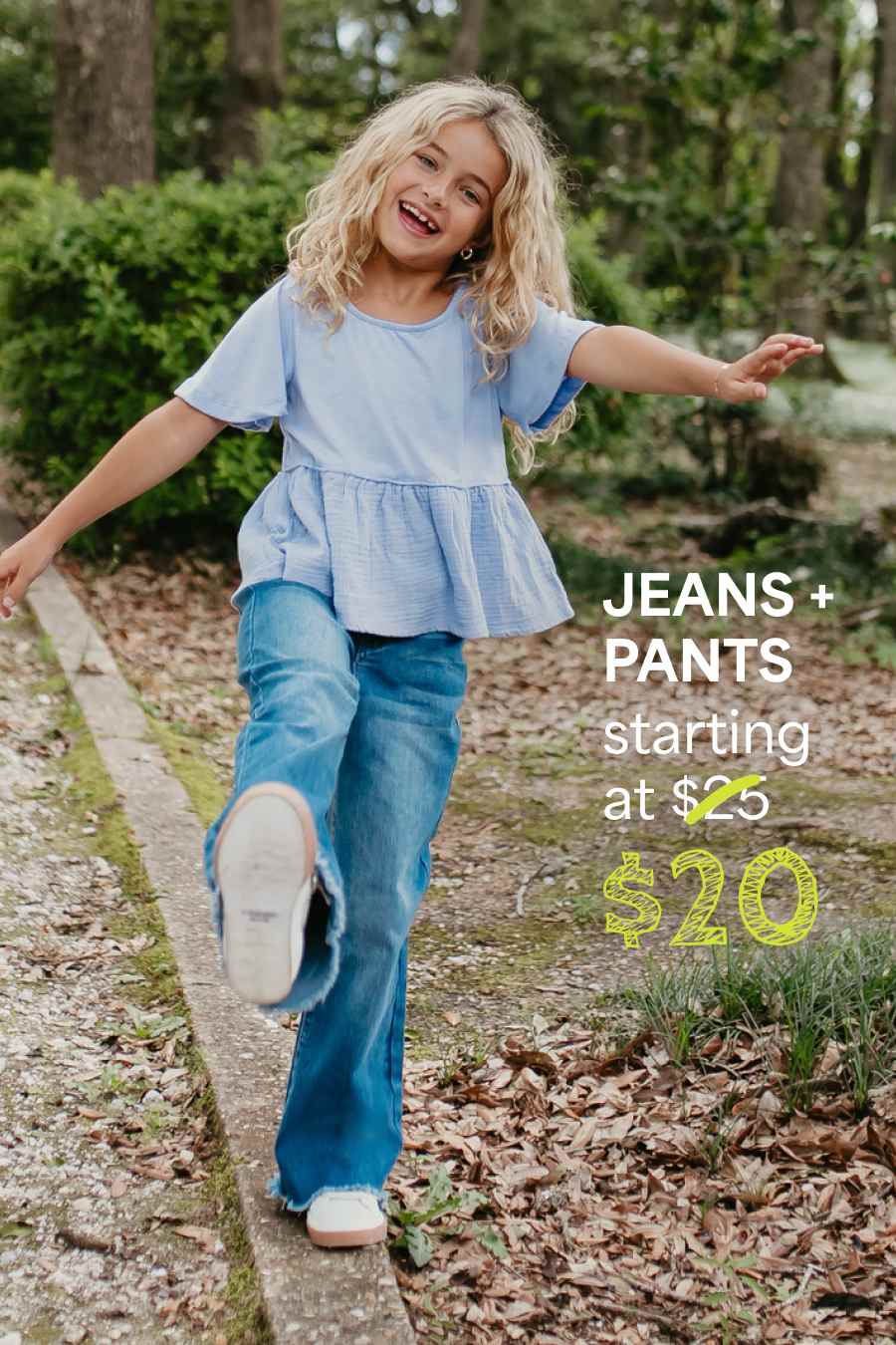 Girl in Stitch Fix: light blue smocked top and flare jeans, playing. Text: “JEANS + PANTS starting at $20.”