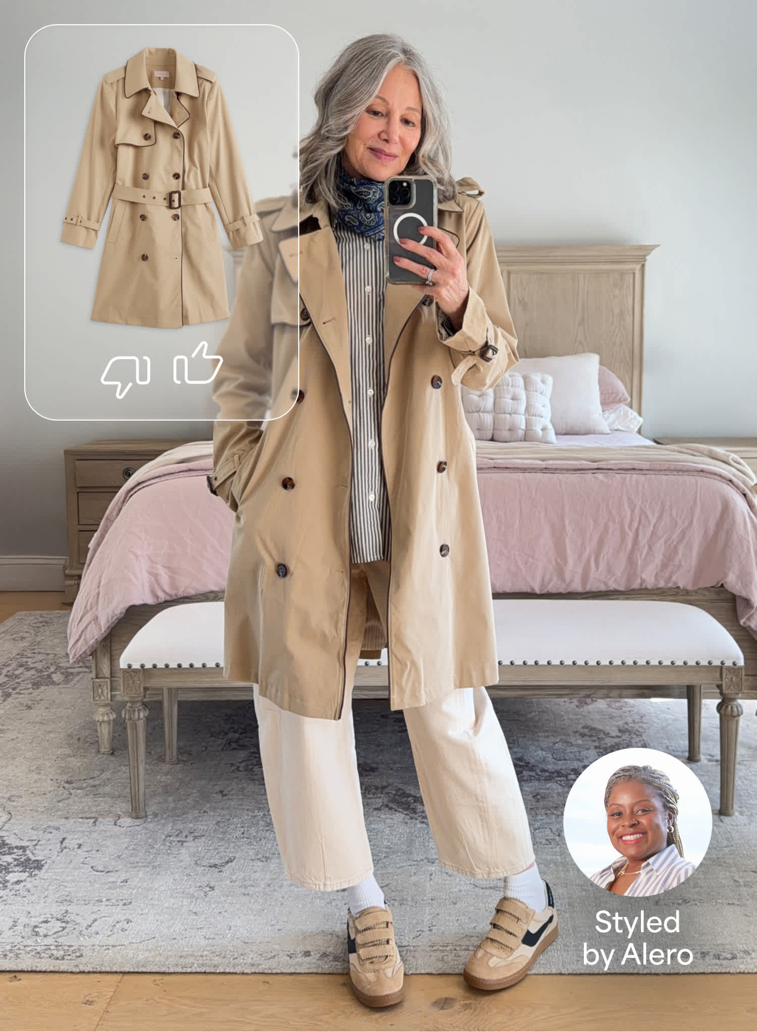 A woman takes a mirror selfie in a bedroom, wearing a beige trench coat layered over a striped shirt, light-colored wide-leg pants, and neutral sneakers. An inset image shows the same trench coat on its own, with thumbs-up and thumbs-down icons suggesting outfit feedback. Text on the image reads “Styled by Alero,” alongside a small circular headshot of the stylist, highlighting a personalized styling recommendation.