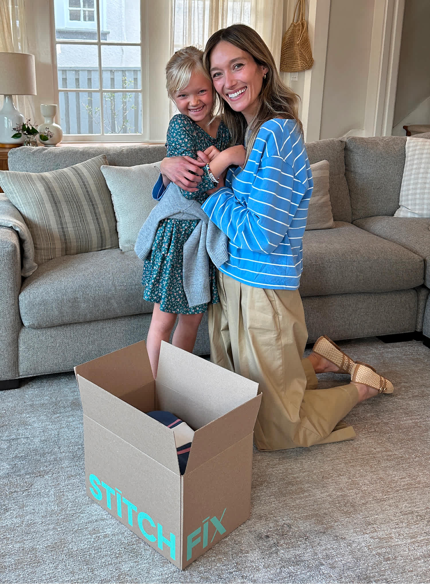 Grid of circular headshots of Stitch Fix stylists displayed on a teal background. Each portrait shows a smiling stylist, with their first name labeled below, including names such as Alexa, Aisjha, Ray, Dania, Gabrielle, Angela, Travis, Emiko, Missy, Alero, Alicia, Matt, Liz, Kate, Julie, Mika, and others. The collection highlights the diversity of the stylist team and the people behind the personalized styling experience.