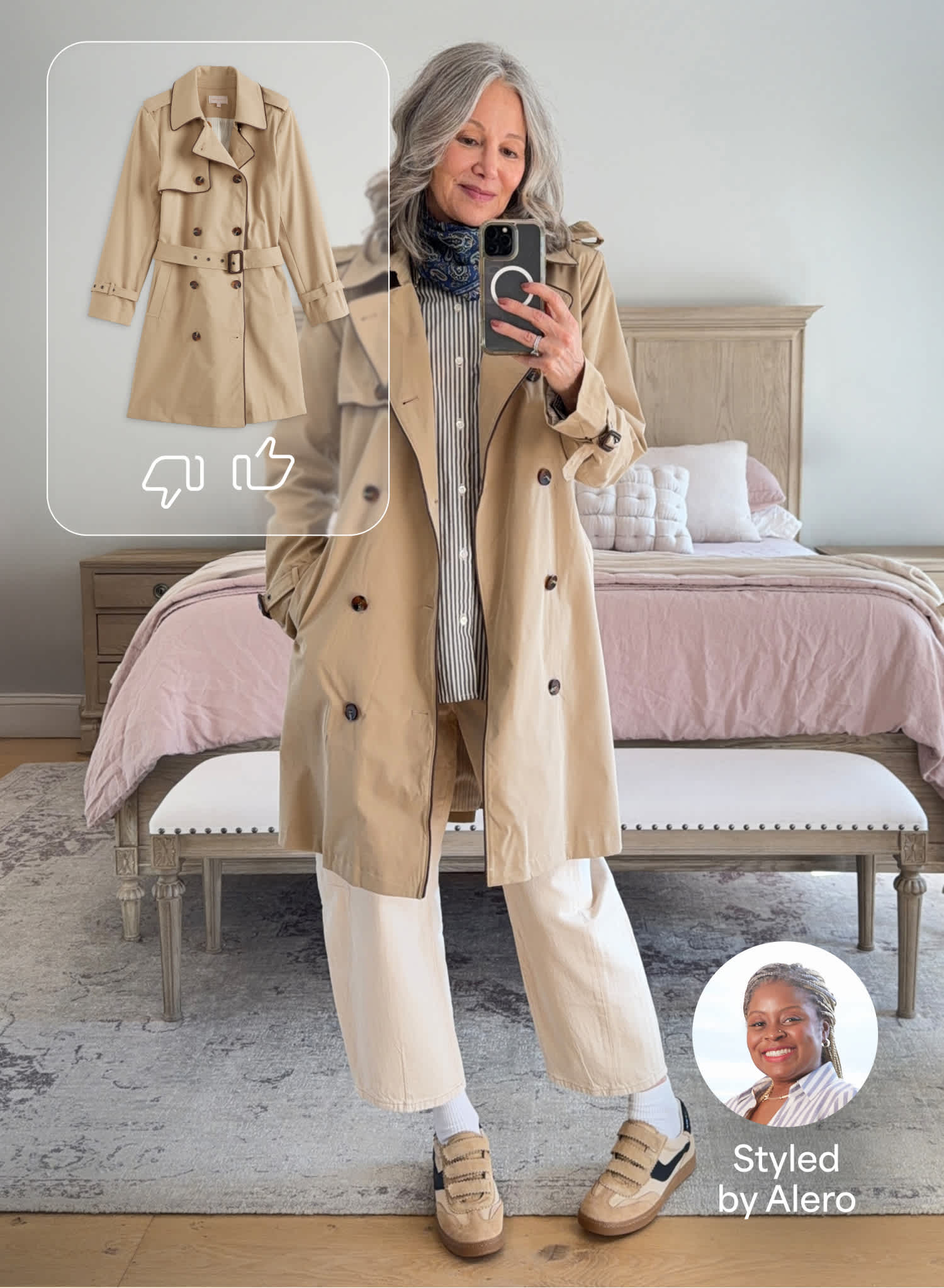 Woman taking a mirror selfie indoors wearing a beige trench coat over a navy dress, paired with green sneakers and a striped scarf. An overlay shows a product image of a beige trench coat with thumbs up/down icons for feedback. Text reads “Styled by Alero.”
