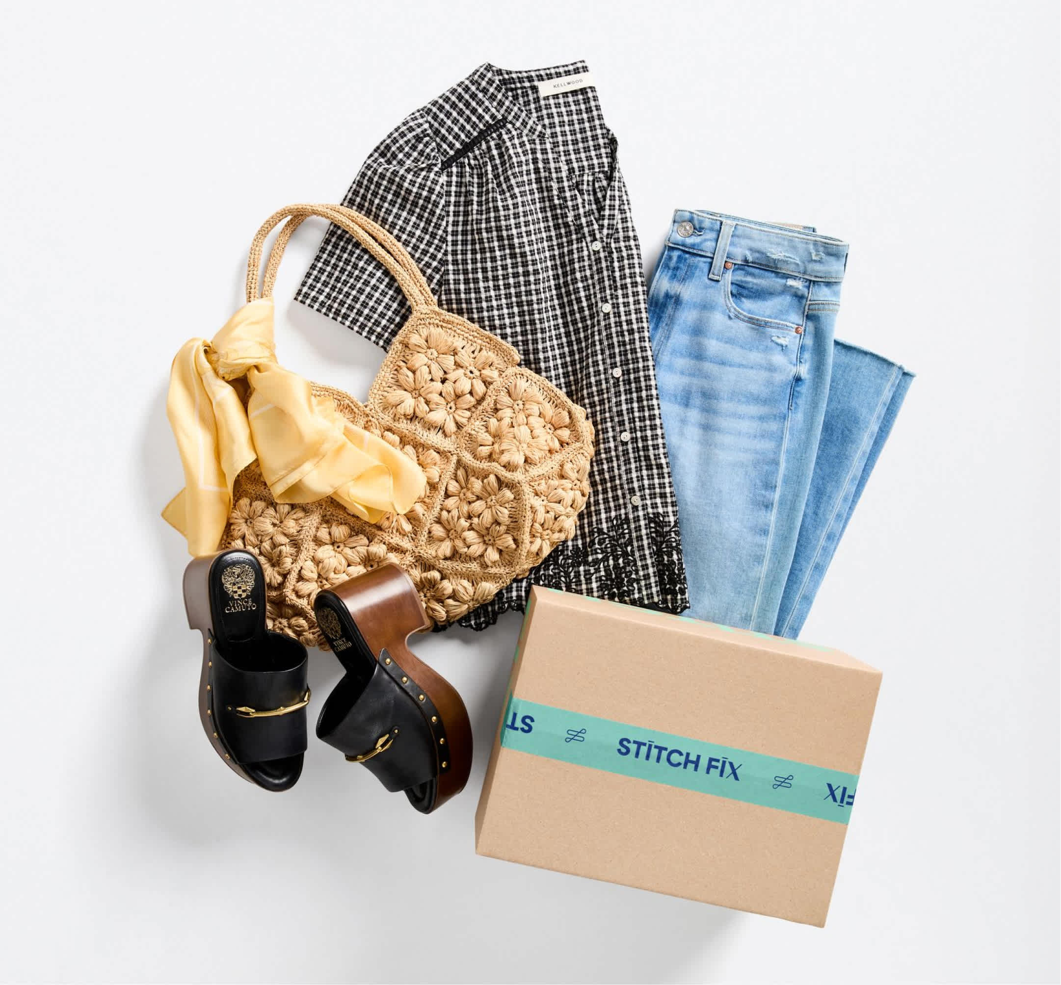 Black check button-down shirt, light blue jeans, woven straw tote, yellow scarf, black loafers