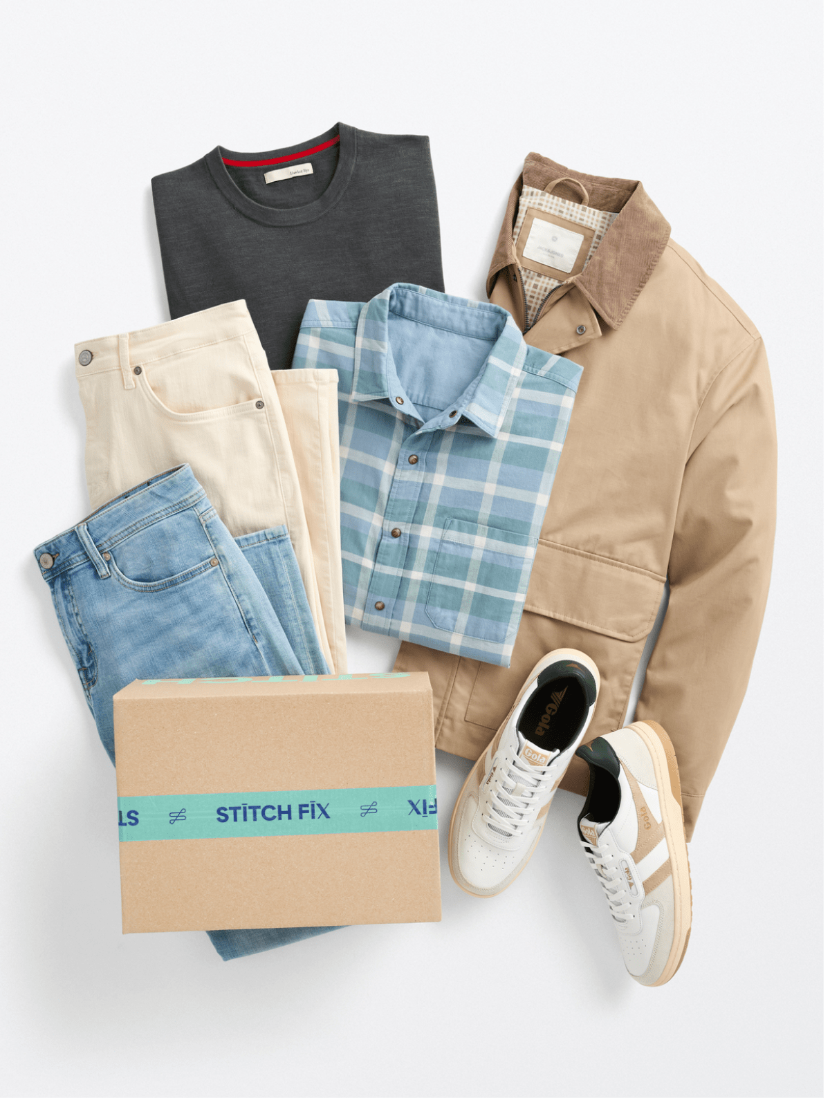 Men’s tan jacket, plaid shirt, cream pants, blue jeans, white sneakers and Stitch Fix box