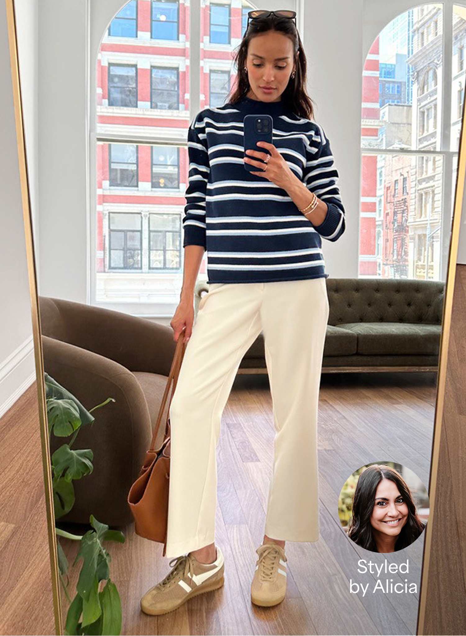 A woman tries on a navy and white striped sweater with cream wide-leg pants and tan sneakers in front of a mirror. A Stitch Fix product card highlights the sweater, and a "Styled by Alicia" badge showcases the personalized styling experience.