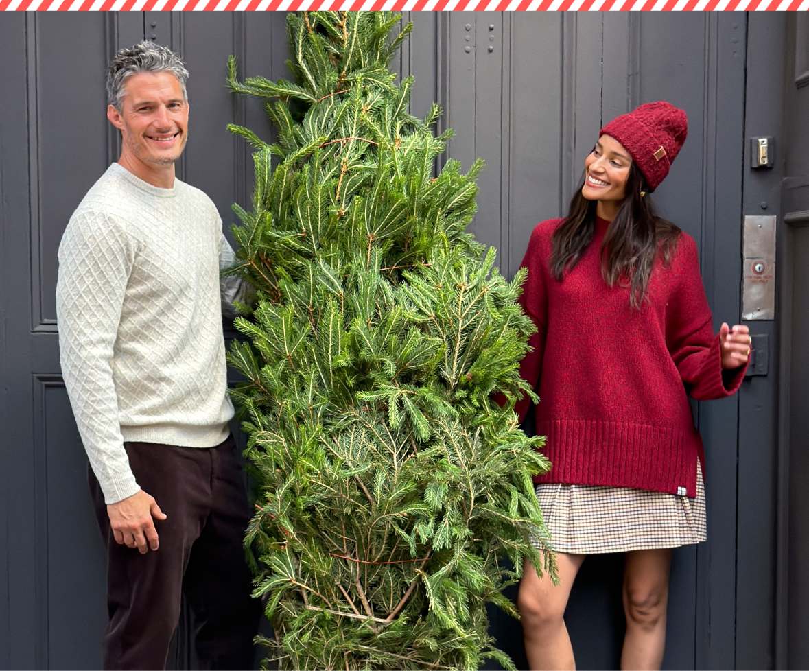 A split fashion image showing a man with sunglasses standing on outdoor steps in a grey knit sweater polo, dark trousers, and white sneakers on the left, and a smiling man crouching on a city sidewalk next to a brindle dog, wearing a navy polo sweater and tan chinos on the right.
