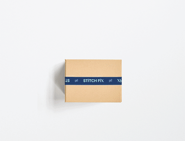 Stitch Fix shipment box with Stitch Fix men's clothing items including shoes, shirt, button-down and pants.