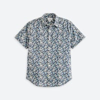 Men's blue short sleeve button front collared shirt with flower pattern