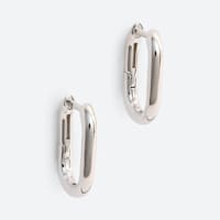 Women's silver oval hoops