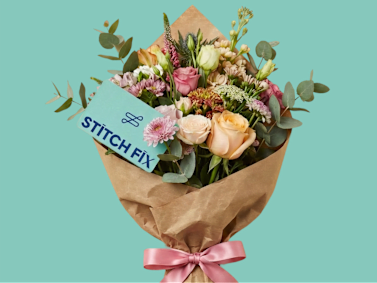 Bouquet of flowers with Stitch Fix gift card tucked in