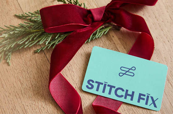 A Stitch Fix gift card on a holiday ribbon