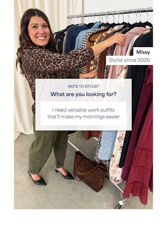 Stylist wearing leopard print blouse, olive green trousers, and black heels while reaching for clothes on a rack