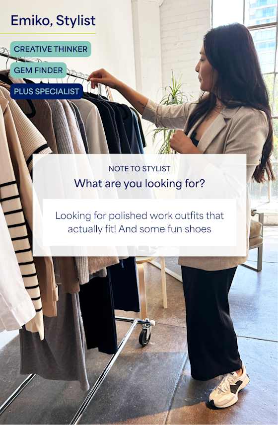 Stylist wearing beige blazer and black skirt browsing clothes on a clothing rack