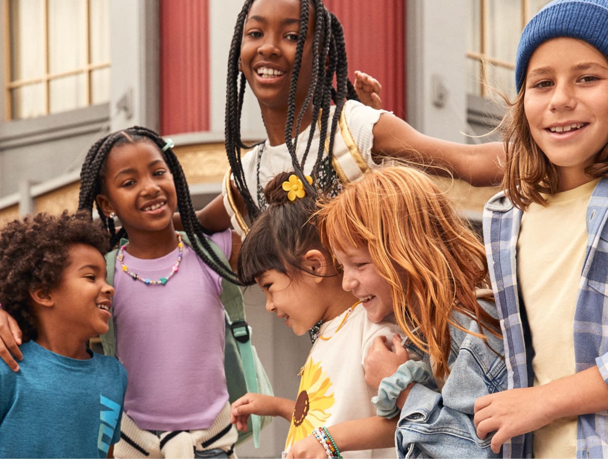 Two kids wearing Stitch Fix kids’ clothing and mom wearing Stitch Fix women's clothing.